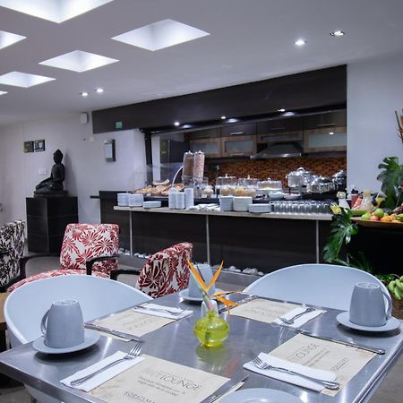 San Simon Hotel Pereira By Soratama Buitenkant foto The restaurant