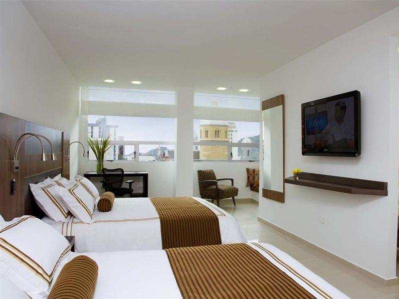 San Simon Hotel Pereira By Soratama Buitenkant foto A room at the hotel