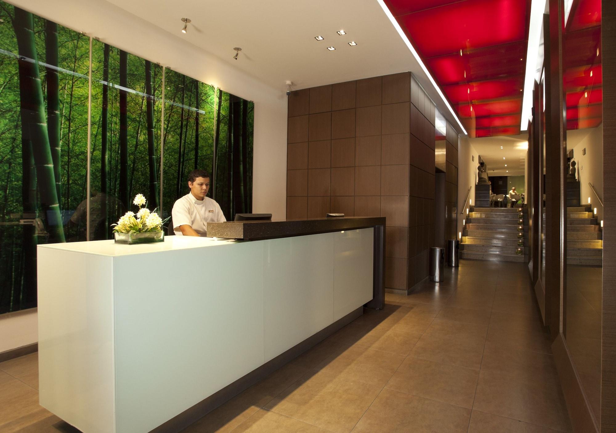 San Simon Hotel Pereira By Soratama Buitenkant foto The reception area of the hotel