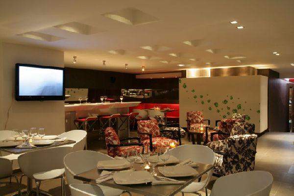 San Simon Hotel Pereira By Soratama Buitenkant foto The interior of the restaurant