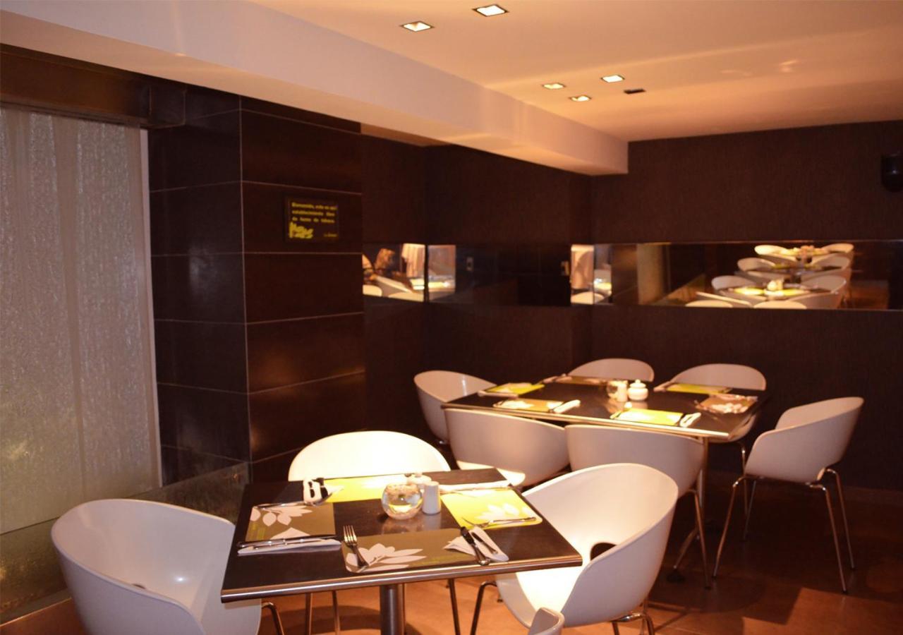 San Simon Hotel Pereira By Soratama Buitenkant foto Interior of the restaurant