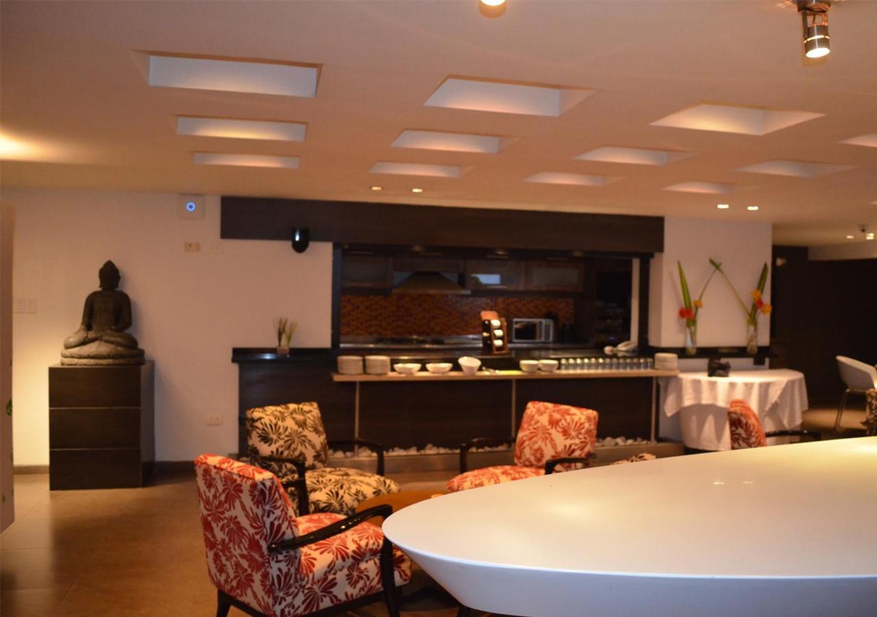 San Simon Hotel Pereira By Soratama Buitenkant foto Interior of the restaurant