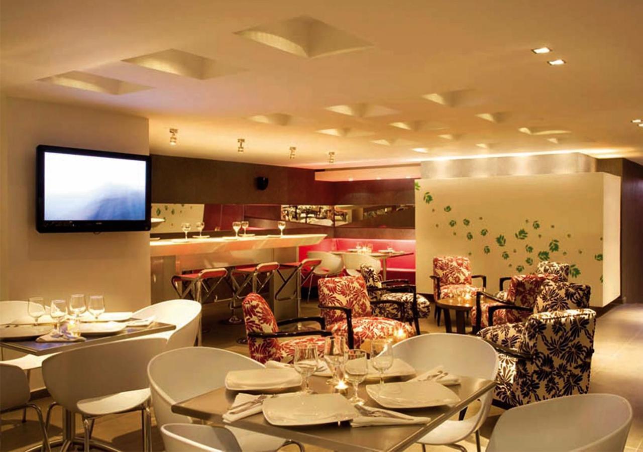 San Simon Hotel Pereira By Soratama Buitenkant foto The restaurant